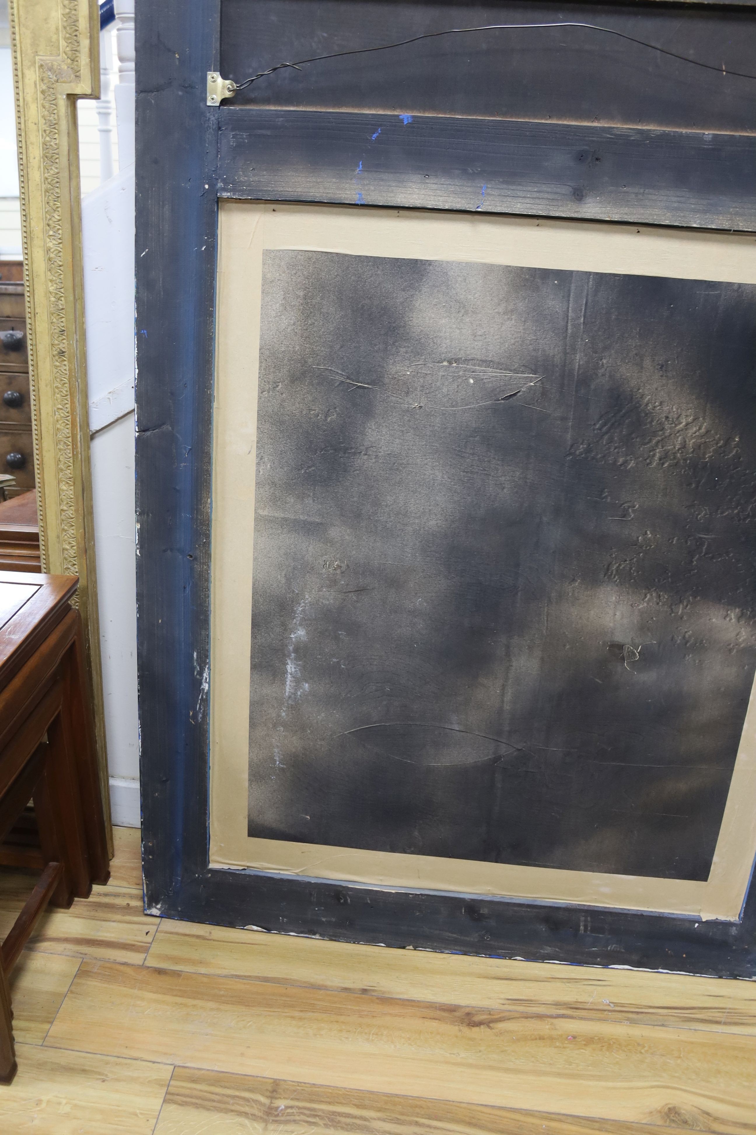 A 19th century French overmantel gilt and gesso mirror with musical themed emblem over on blue background, width 114cm, height 172cm